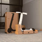 E-scooter partially assembled on cardboard boxes with its packaging box in the background.