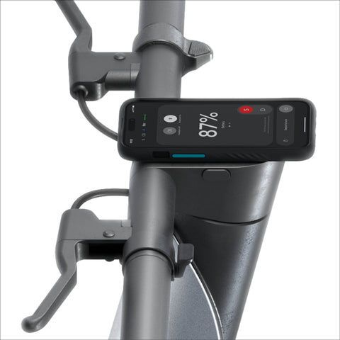 Phone mounted on a bicycle handlebar displaying battery percentage